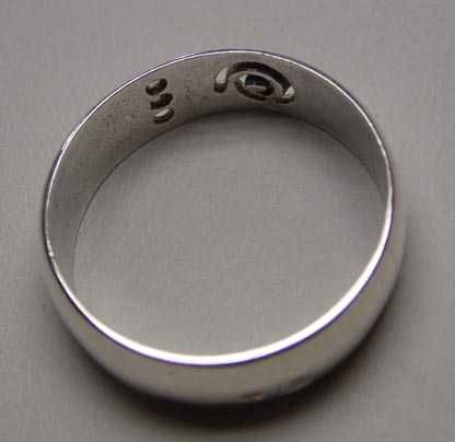 Srebrna obrączka wycinane wzorki R.26. 7 mm.