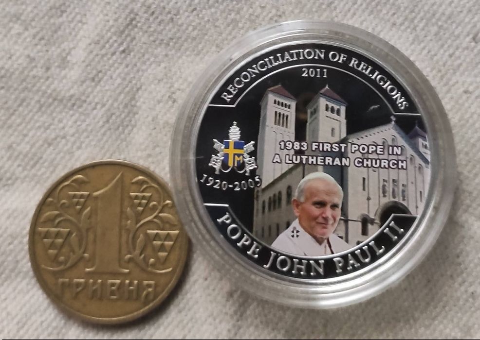 1 долар 2011 рік. " Папа Іоанн Павло ll". Срібне покриття. Тираж 1500