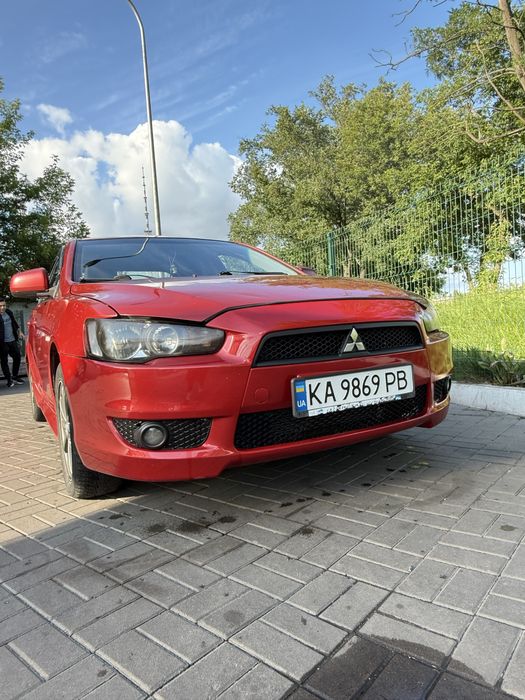 Lancer 10 2011 2.0 автомат / газ