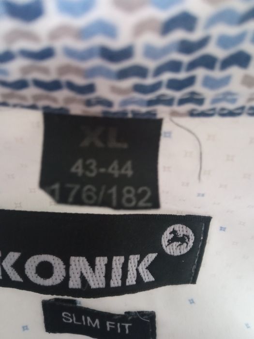 Biała koszula z delikatnym wzorem rozmiar XL