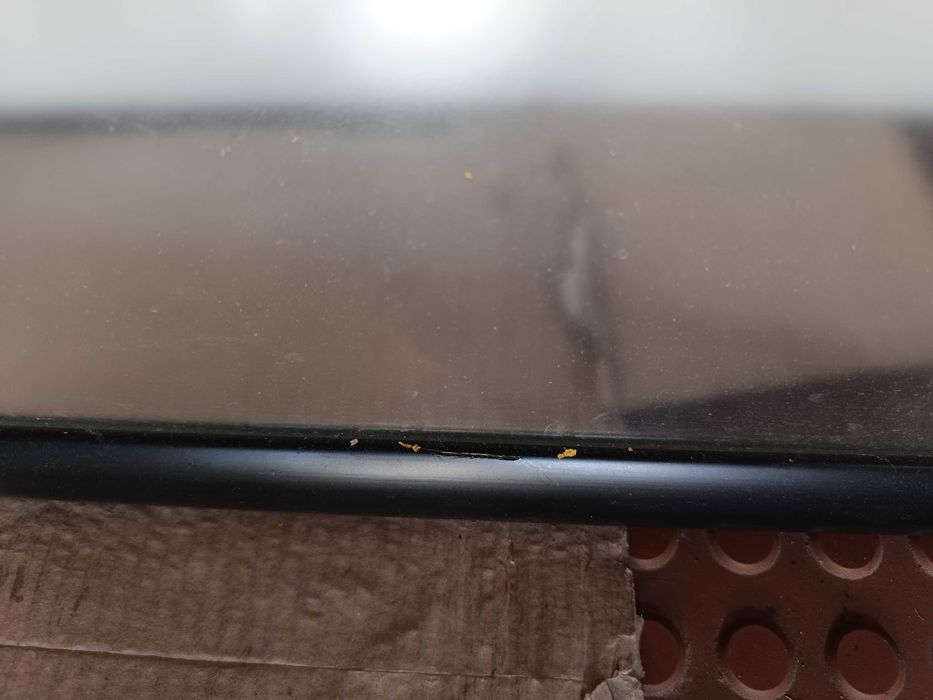 Moldura em vidro anti-reflexo