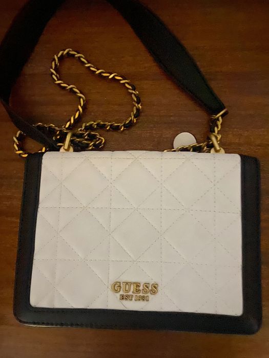 Mala guess pouco usada