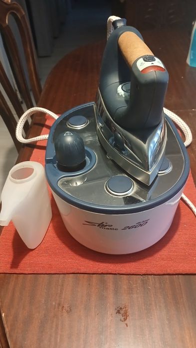 Ferro de engomar usado