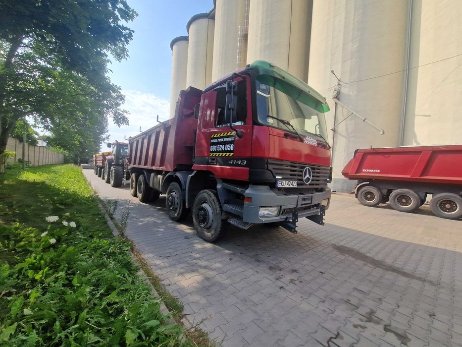 Przewóz maszyn transport traktora koparki laweta niskopodwozie