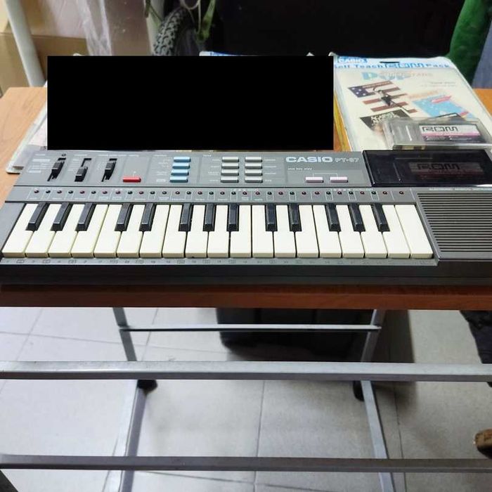 Casio PT‑87 vintage a funcionar com 2 ROM packs Testado