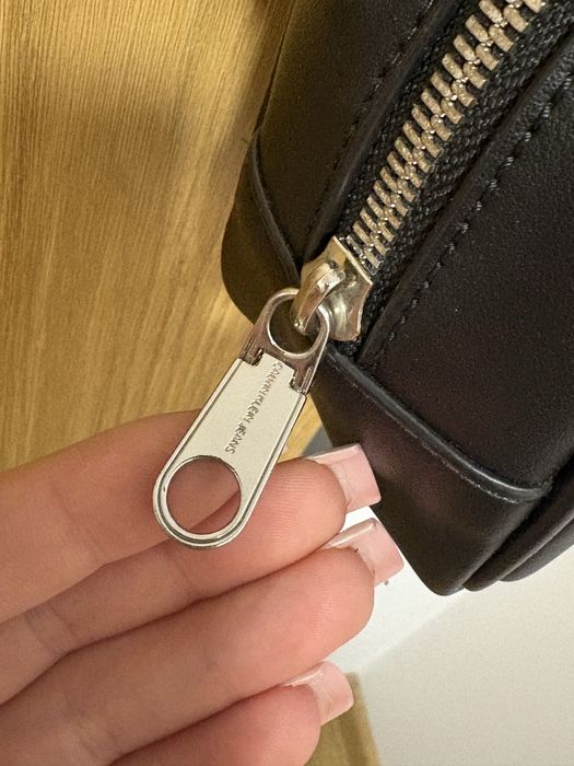 Listonosza Calvin Klein