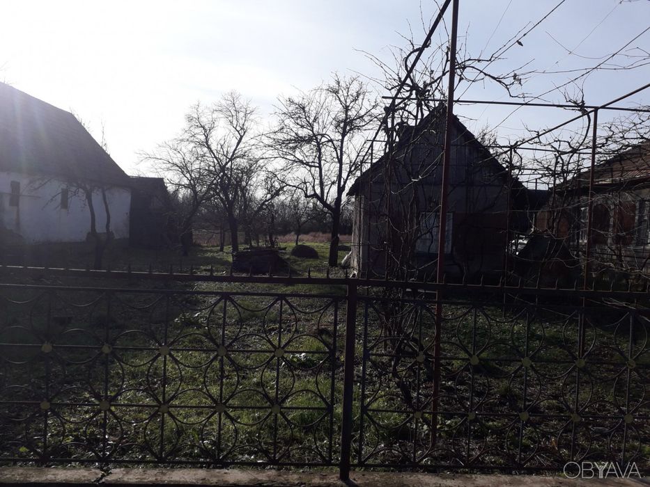 Будинок та земельна ділянка