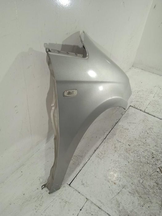 GUARDA-LAMAS FRONTAL DIREITO FIAT IDEA 2004