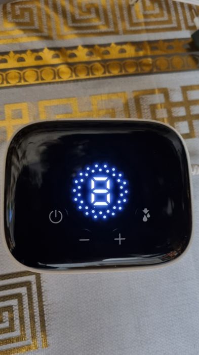 Молокоотсос електричний