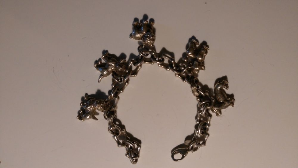 Bransoleta Tiffany&Co. , srebrna 925 , z miniaturami psów. Zamienię