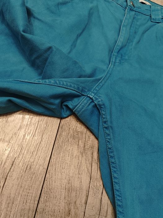 Spodnie jeansowe niebieskie Bershka balloon L 100 % bawełna z dziurami