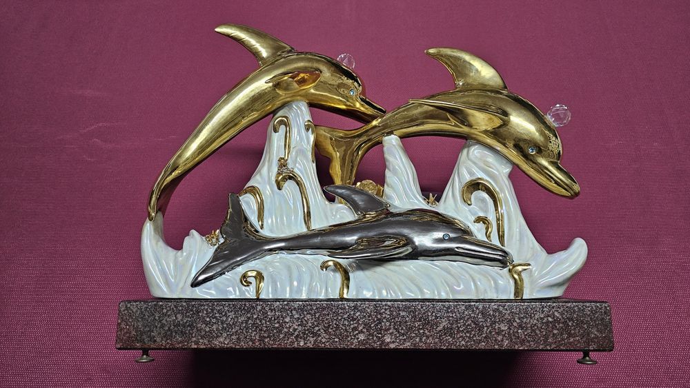 Estatueta golfinhos em porcelana