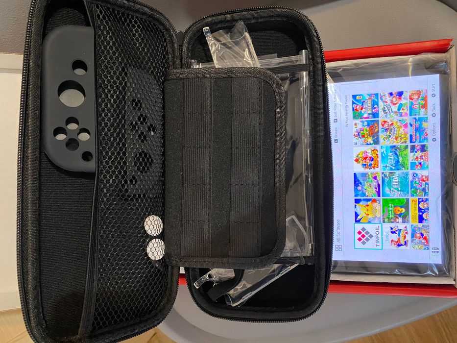 Nowa konsola Nintendo Switch OLED – przerobiona  + karta 256 GB + etui