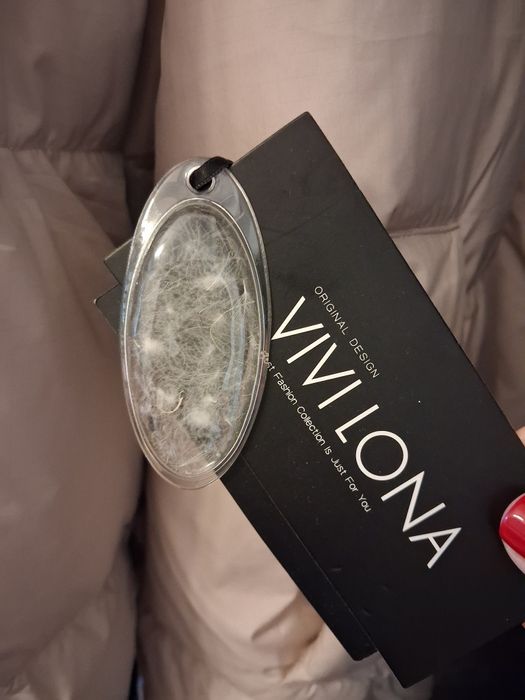 Жiночий пуховик, натуральне хутро.