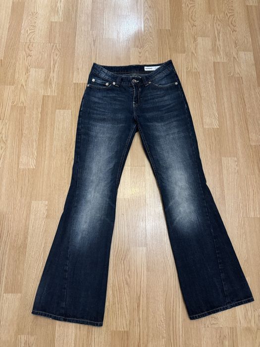 Мішкуваті розкльошені джинси “Bershka” з низькою посадкою