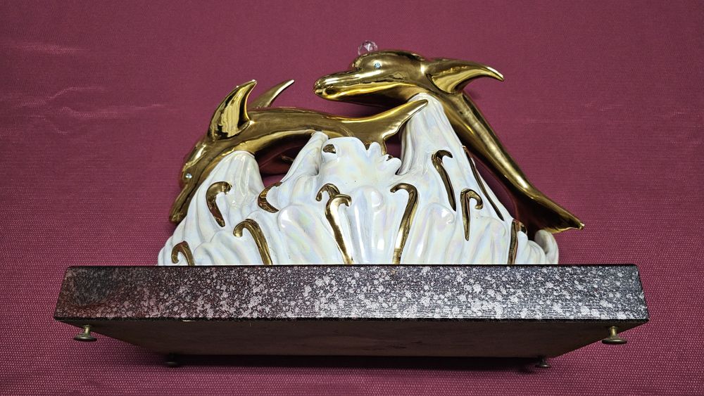 Estatueta golfinhos em porcelana