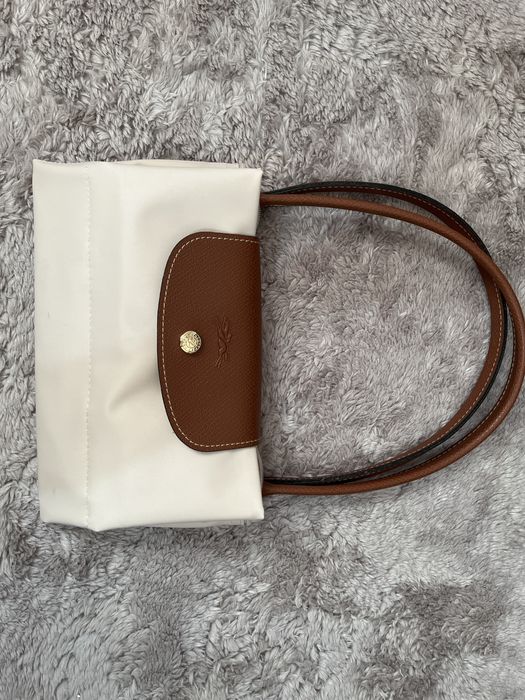 Longchamp de cor beje