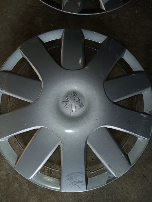 Tampões Peugeot originais roda 14 usados..