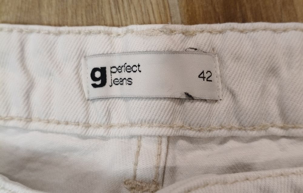 Spodnie jeansowe męskie białe 42