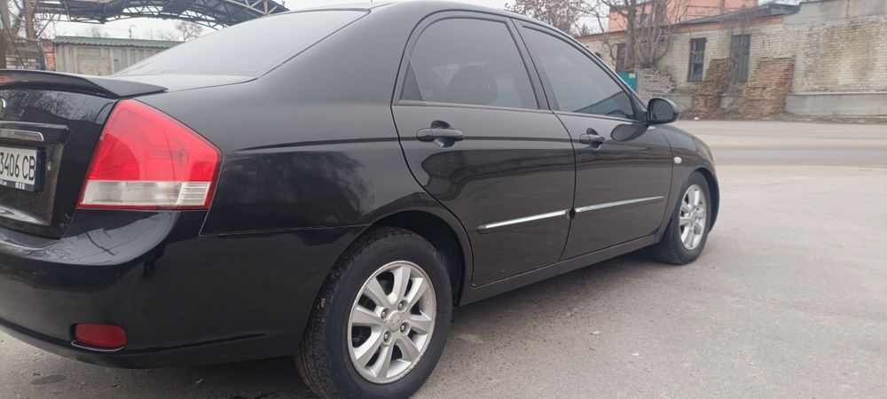 Kia cerato 2.0  Автомат газ бензин