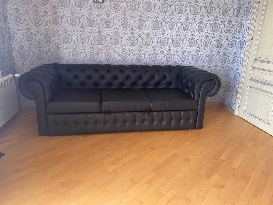 Кожаный раскладной диван