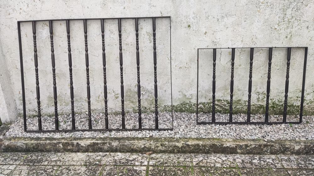 Grades de ferro pintado a castanho