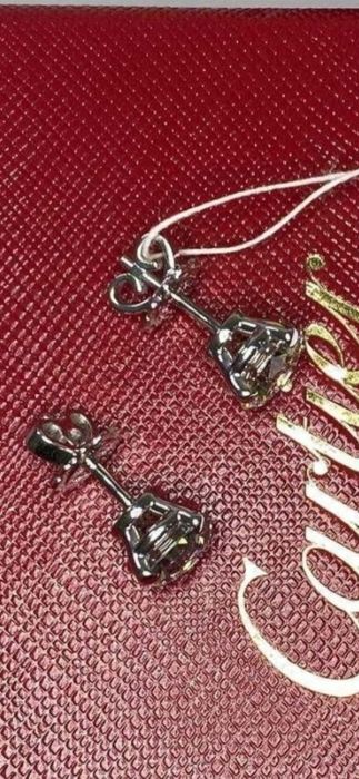 Золотые серьги Cartier с 4.08ct натуральные бриллианты. Белое золото.