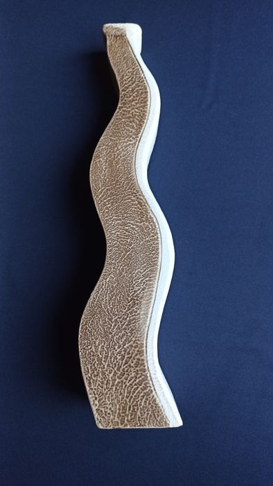 Wavy ceramic jug.64862790625026124