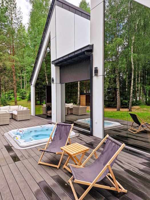 Dom do wynajęcia z jacuzzi, prywatną plażą i pomostem