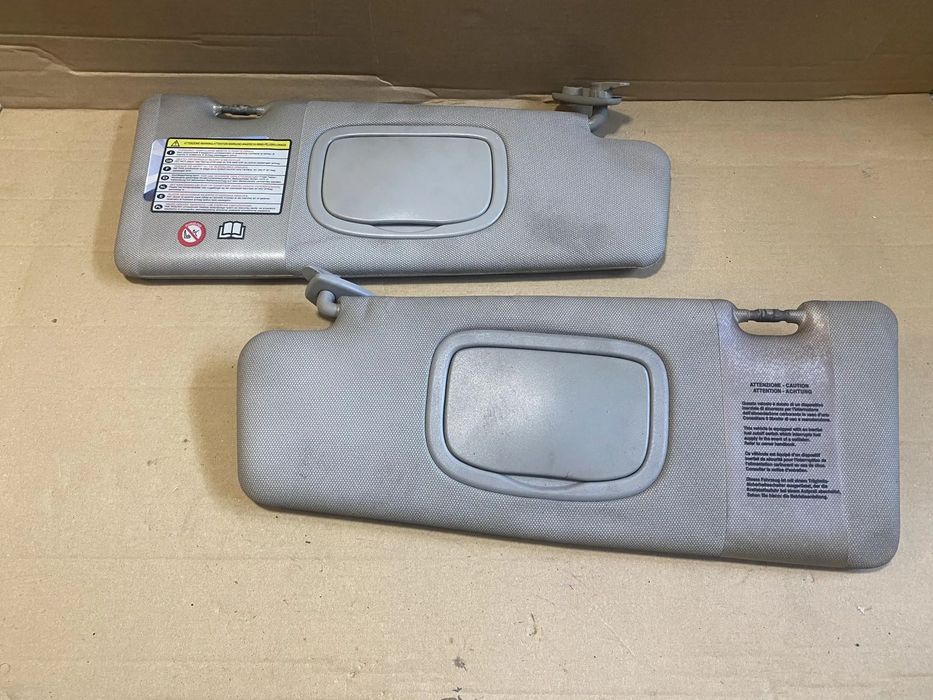 Osłona przeciwsłoneczna słonecznik Fiat Bravo II prawa lewa OE