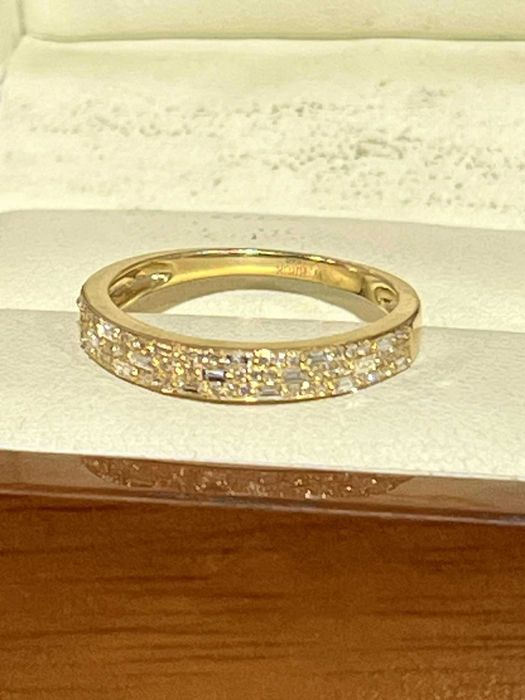 Złoty pierścionek z diamentami W.Kruk, 2.32gr, pr585, 0.27ct/Komis