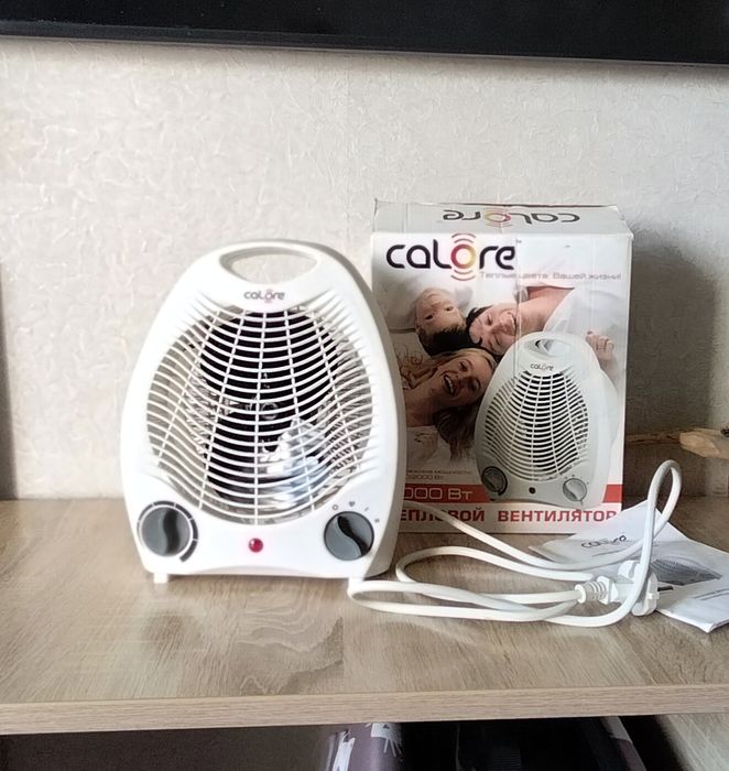 Тепловентилятор ,обогреватель два в одном.Calore