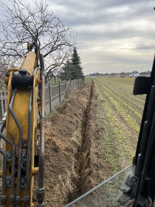 Uslugi minikoparka , koparka ,  kopanie fundamety , szamba .