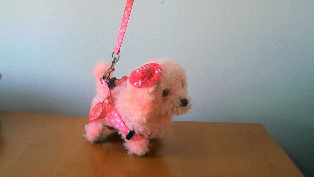 Cachorrinho a pilhas cor-de-rosa