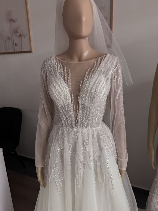 Nowa piekna błyszcząca suknia ślubna bogato zdobiona z rękawem 38