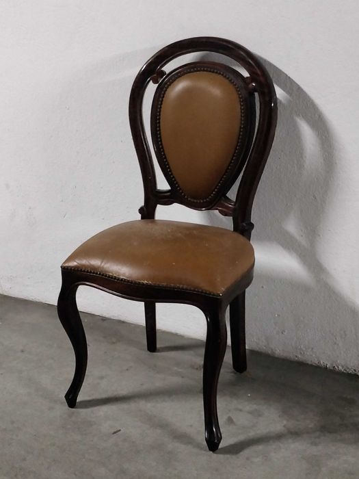Wooden upholstered chair.