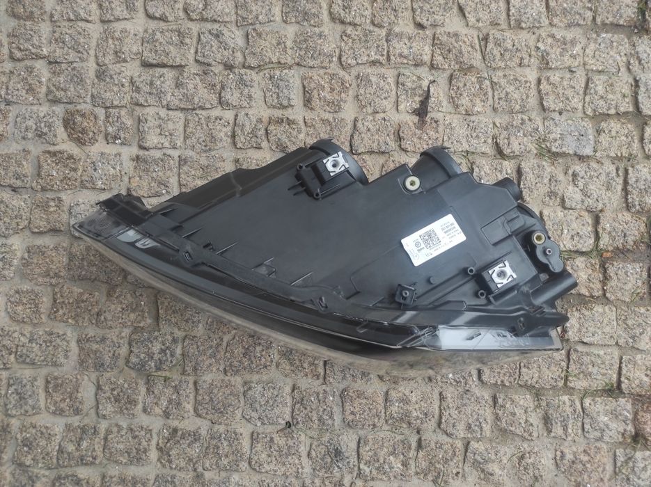 Farol esquerdo Volkswagen Polo IV