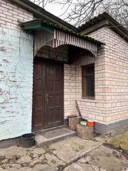 Пів будинку в центрі Баришівки