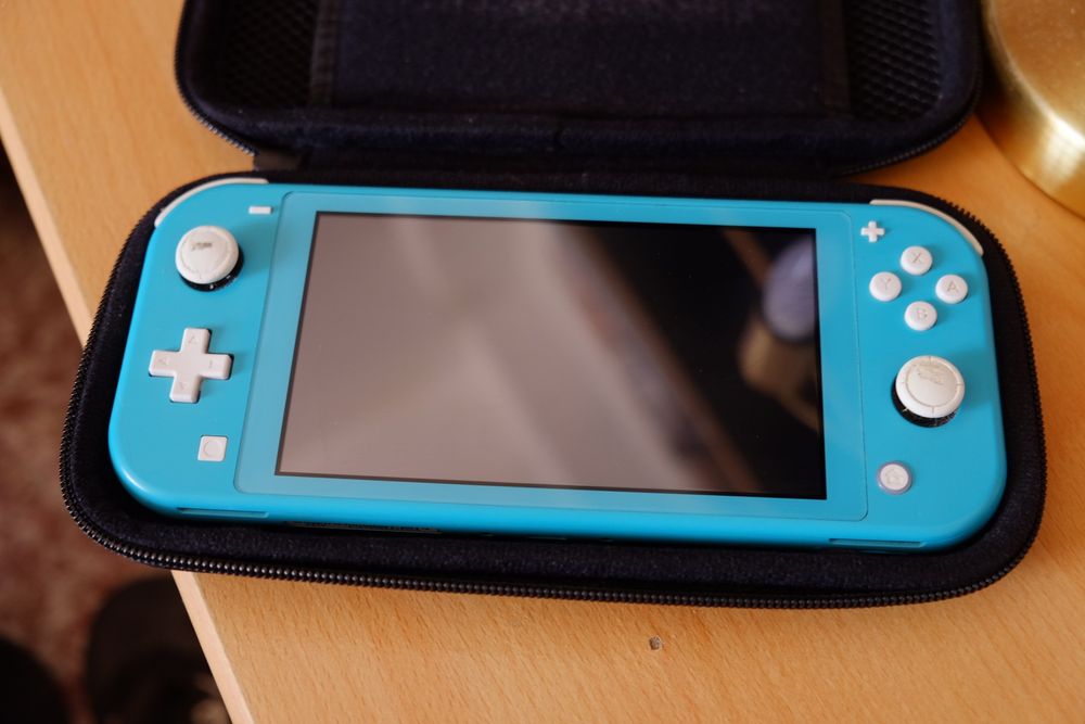 Nintendo Switch e carregador