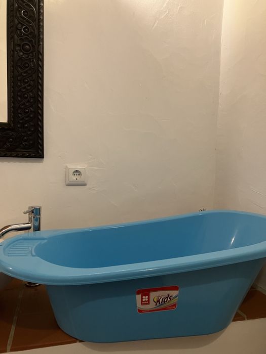 Cama viagem e banheira