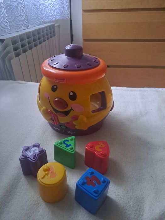 Garnuszek Fisher Price