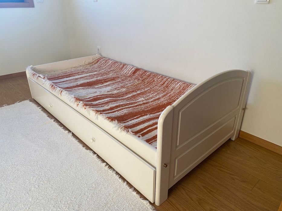 Single bed in beige color