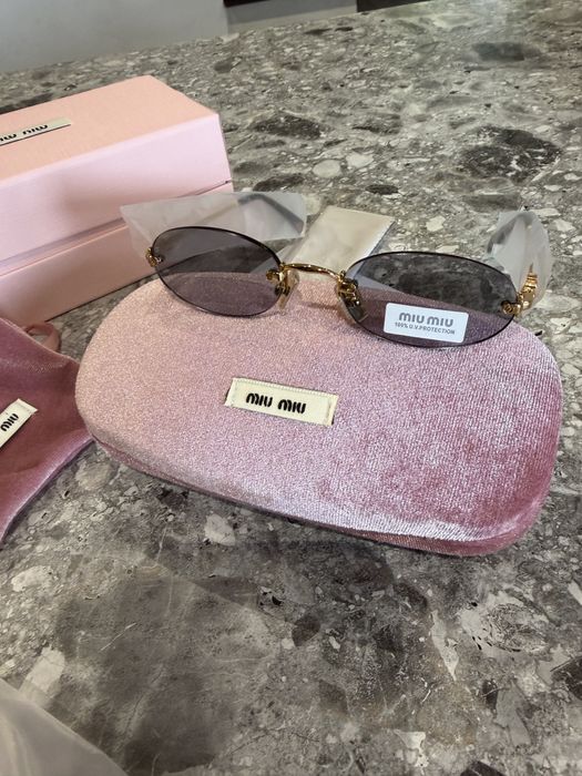 Сонцезахисні очки miu miu