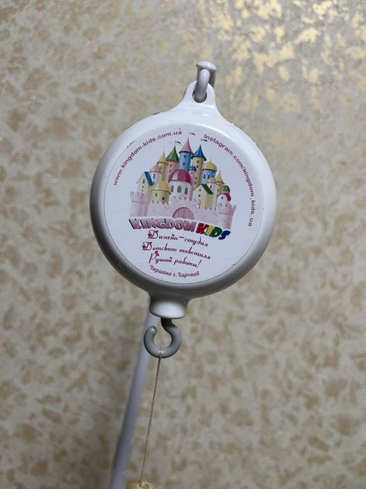 Музичний мобіль в дитяче ліжко