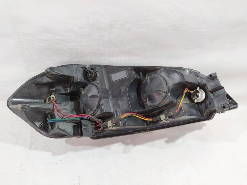 Фара передня ліва Chevrolet Impala 2009-2013 25958359
