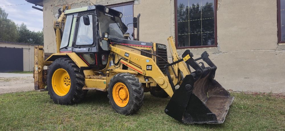 Sprzedam koparko ladowarka caterpillar cat 428b  4x4 pelna opcja