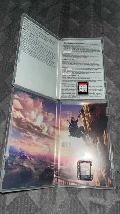 Nintendo Switch 1 + etui + 2 gry