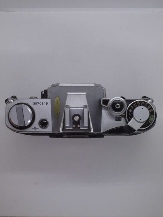 Canon AE-1 + Canon FD 50mm f/1.8 SC