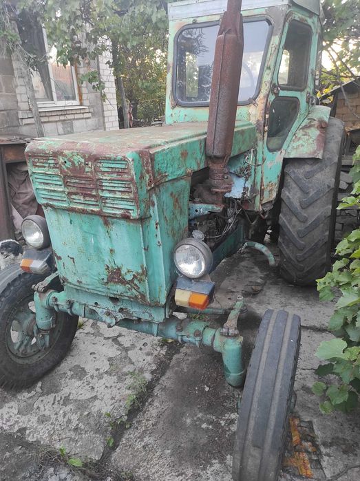 Трактор т40ам з плугом та дисками