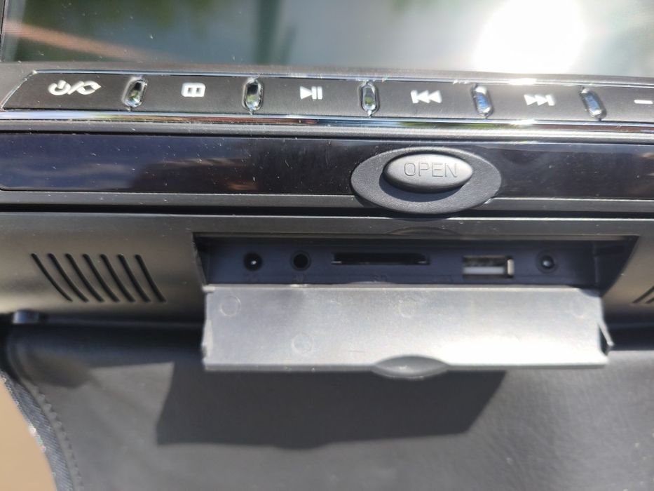 Encosto de cabeça com DVD